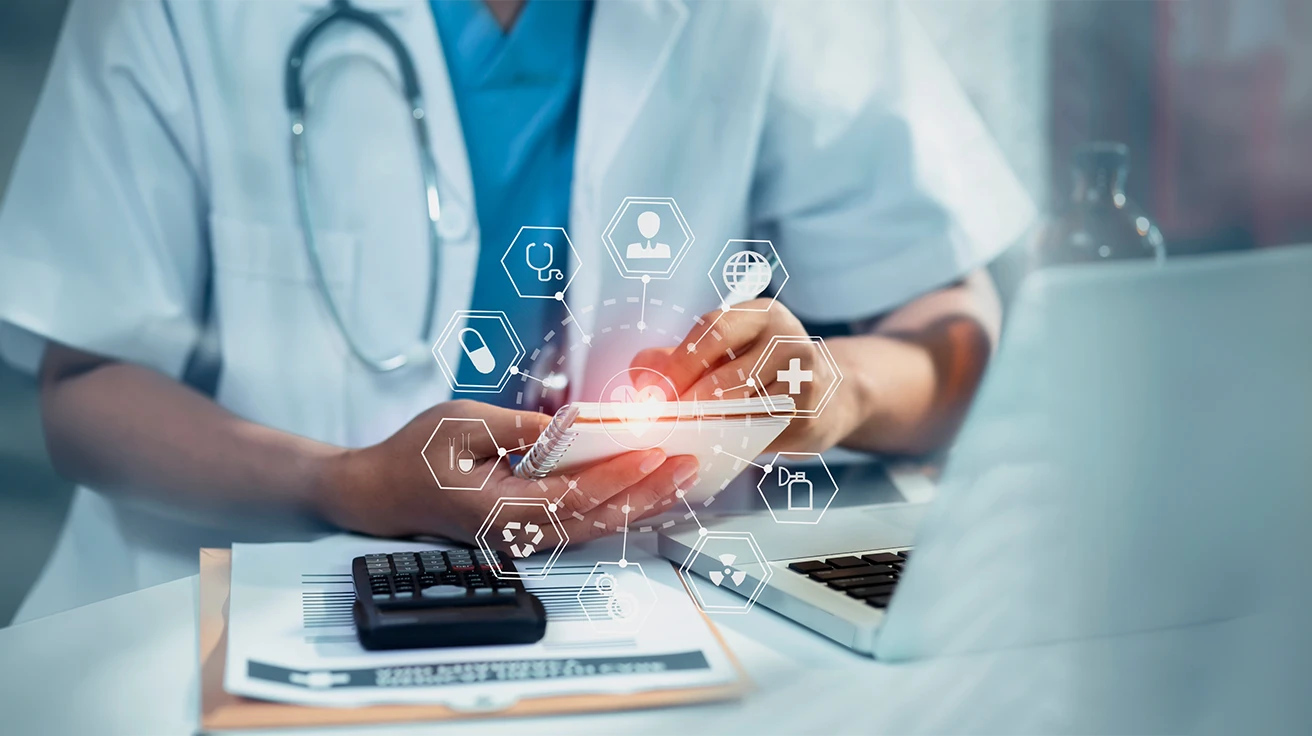 Healthcare professional reviewing digital patient records using patient journey mapping services to improve healthcare experiences